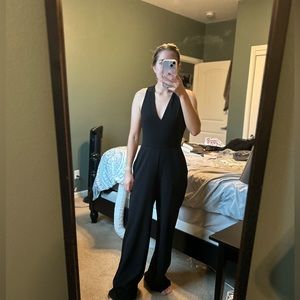 Black jumpsuit with pockets. Brand new never worn from Express